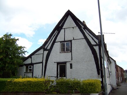 Cruck frame black and white house in Ledbury, Herefordshire Cruck frame black and white house in Ledbury, Herefordshire
